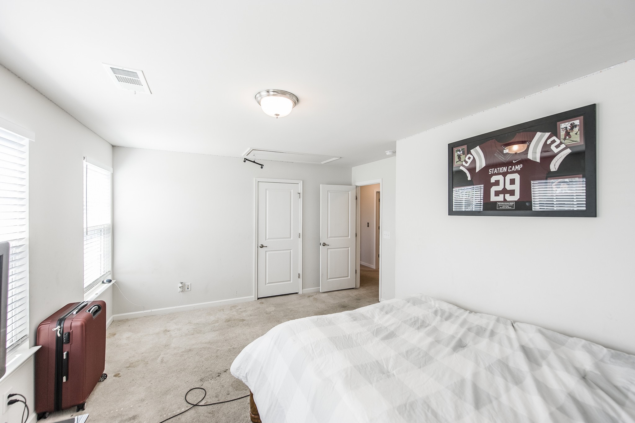 140 Hackney Lane Gallatin, TN 37066 - Photo 46 of 57 a spacious bedroom with a bed and a couch
