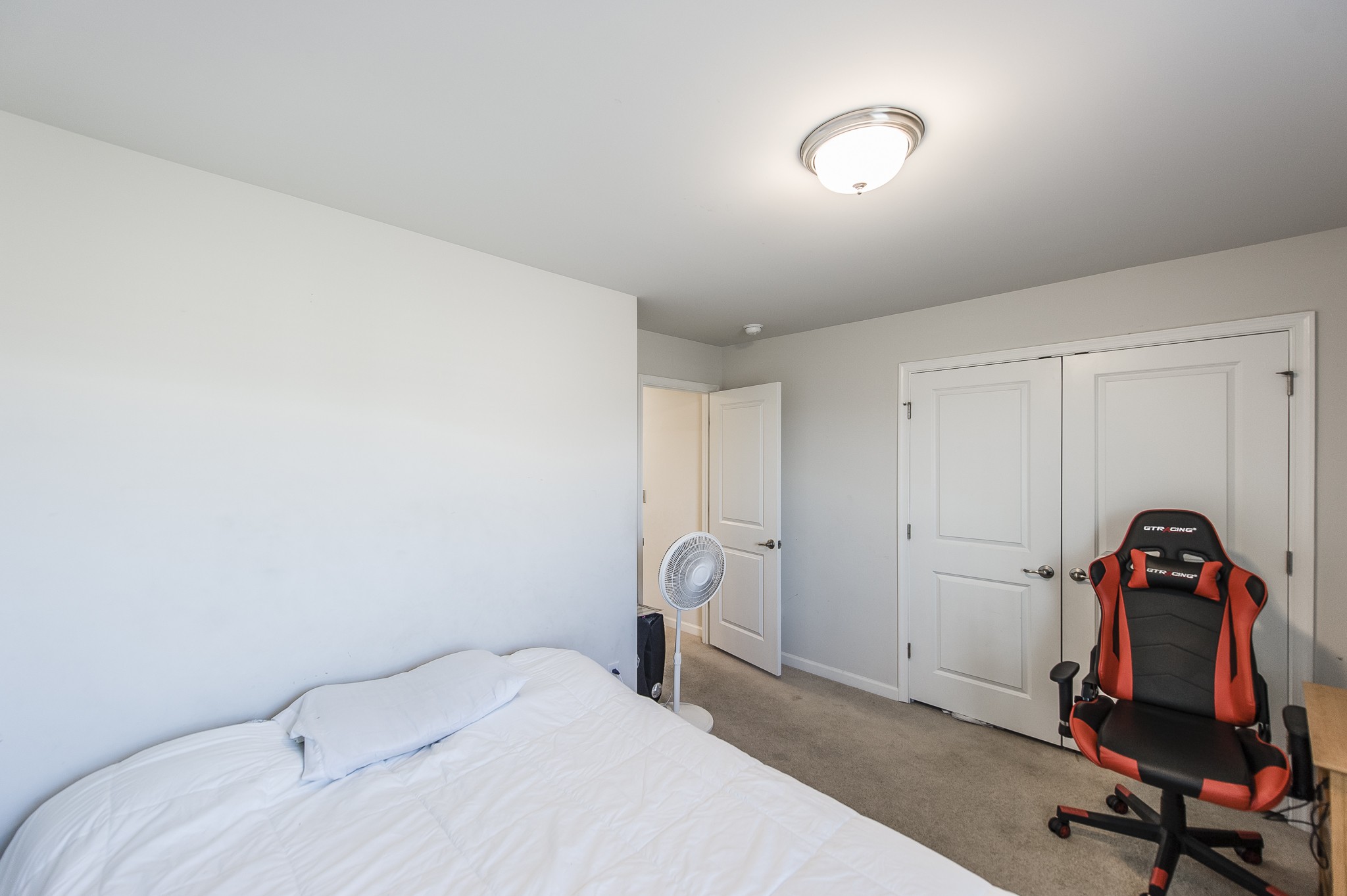 140 Hackney Lane Gallatin, TN 37066 - Photo 49 of 57 a bedroom with a bed and a chair