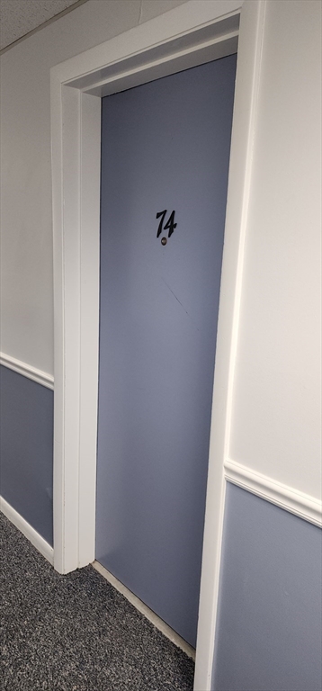 74 Leonard Road, Unit 74 Boxborough, MA 01719 - Photo 3 of 11 a view of staircase