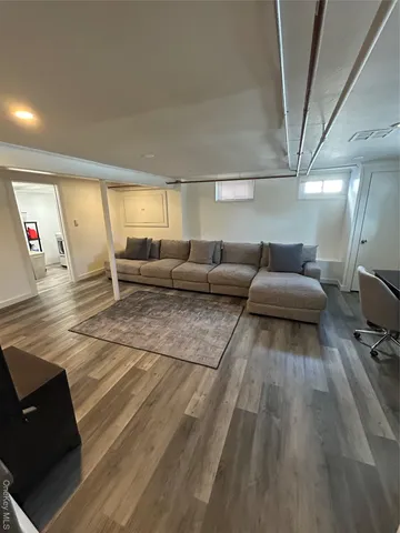 a living room with furniture and a couch