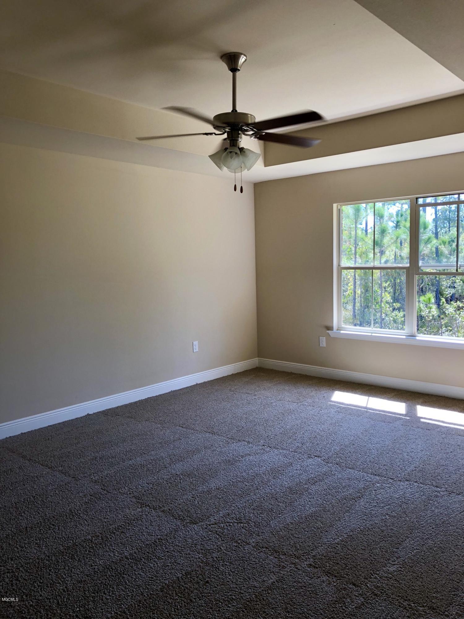 6861 Biddix Evans Road Ocean Springs, MS 39564 - Photo 23 of 50 Master bedroom with trey ceilings