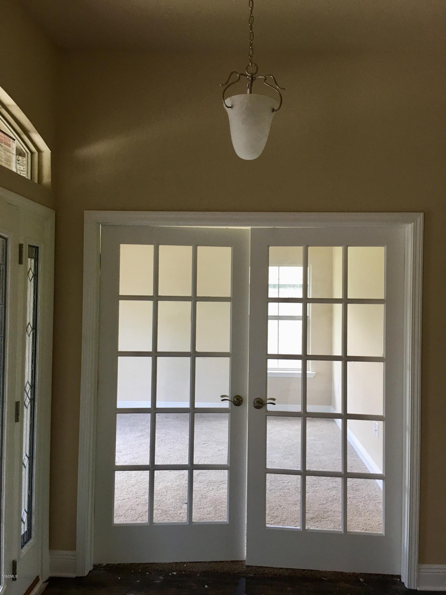 6861 Biddix Evans Road Ocean Springs, MS 39564 - Photo 5 of 50 French doors into office/study