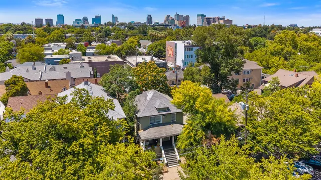 a view of an entryway with wooden floor and stairs