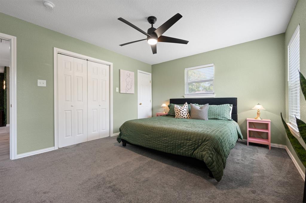 806 Colonial Drive Cleburne, TX 76033 - Photo 19 of 27 a bedroom with a bed and window