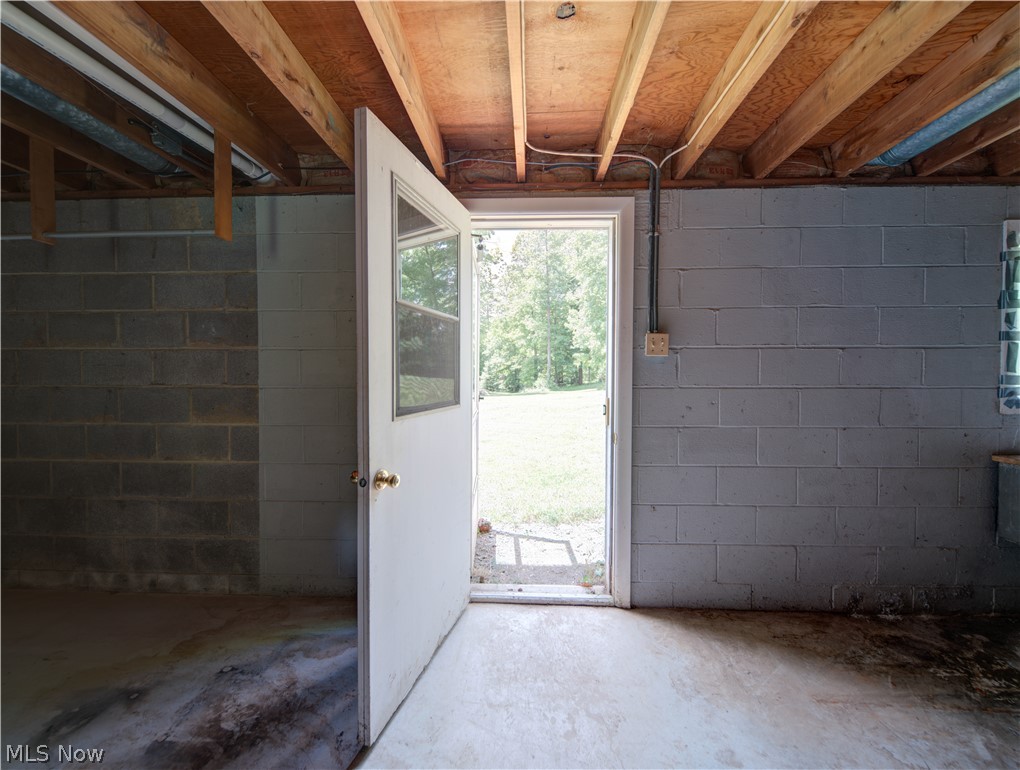 11430 Ferry Road Chesterland, OH 44026 - Photo 26 of 38 Doorway to outside featuring concrete floors
