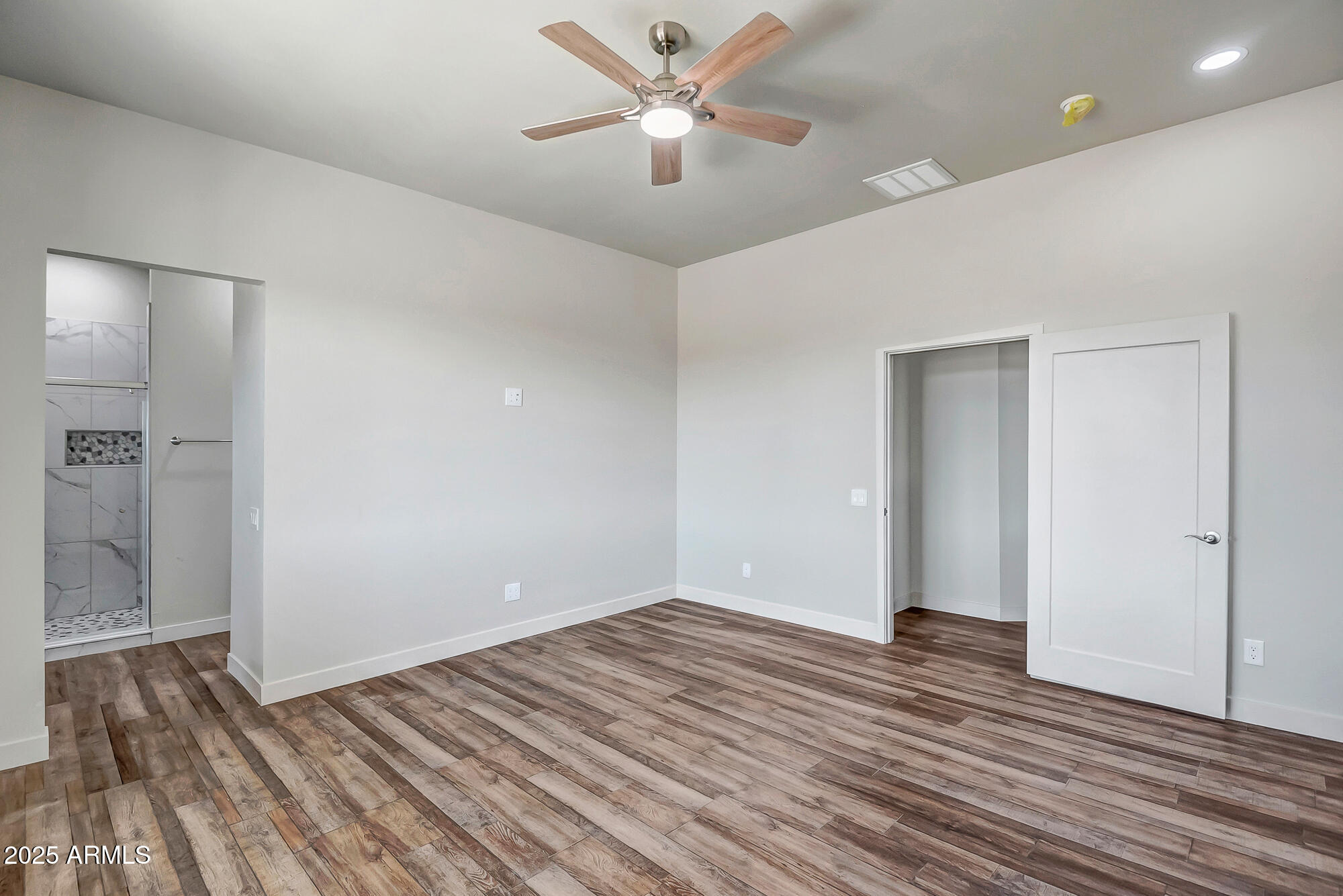25113 West Lowden Road Wittmann, AZ 85361 - Photo 16 of 37 Master bedroom