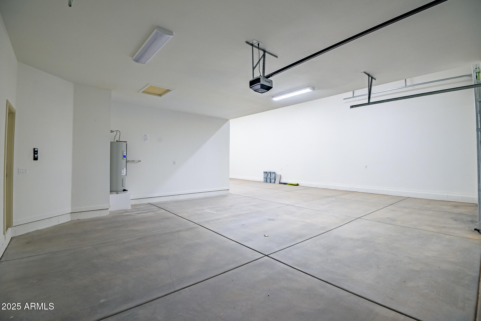 25113 West Lowden Road Wittmann, AZ 85361 - Photo 31 of 37 Inside garage