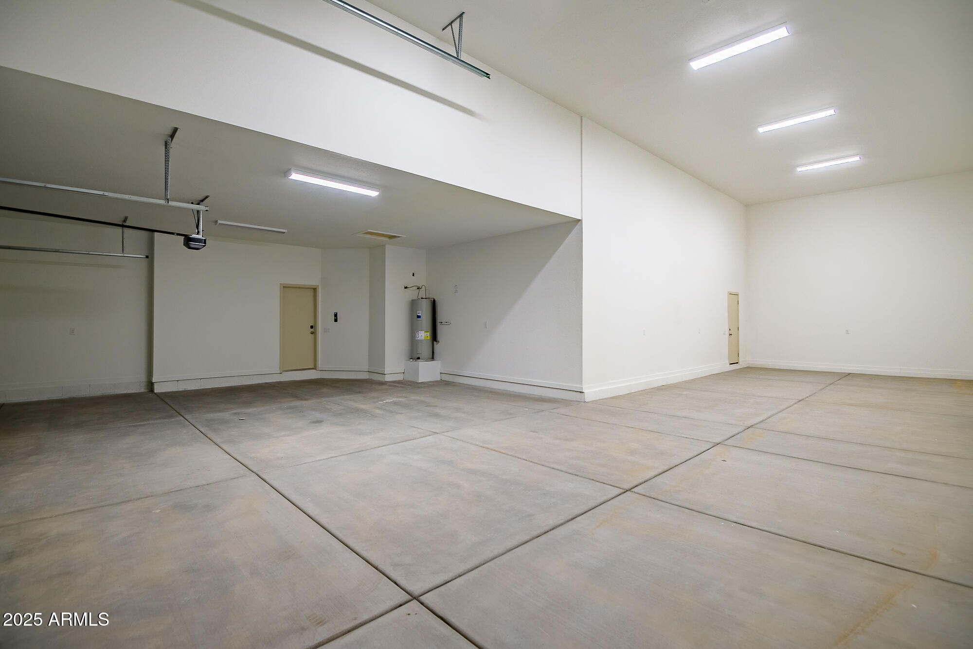 25113 West Lowden Road Wittmann, AZ 85361 - Photo 32 of 37 Inside garage