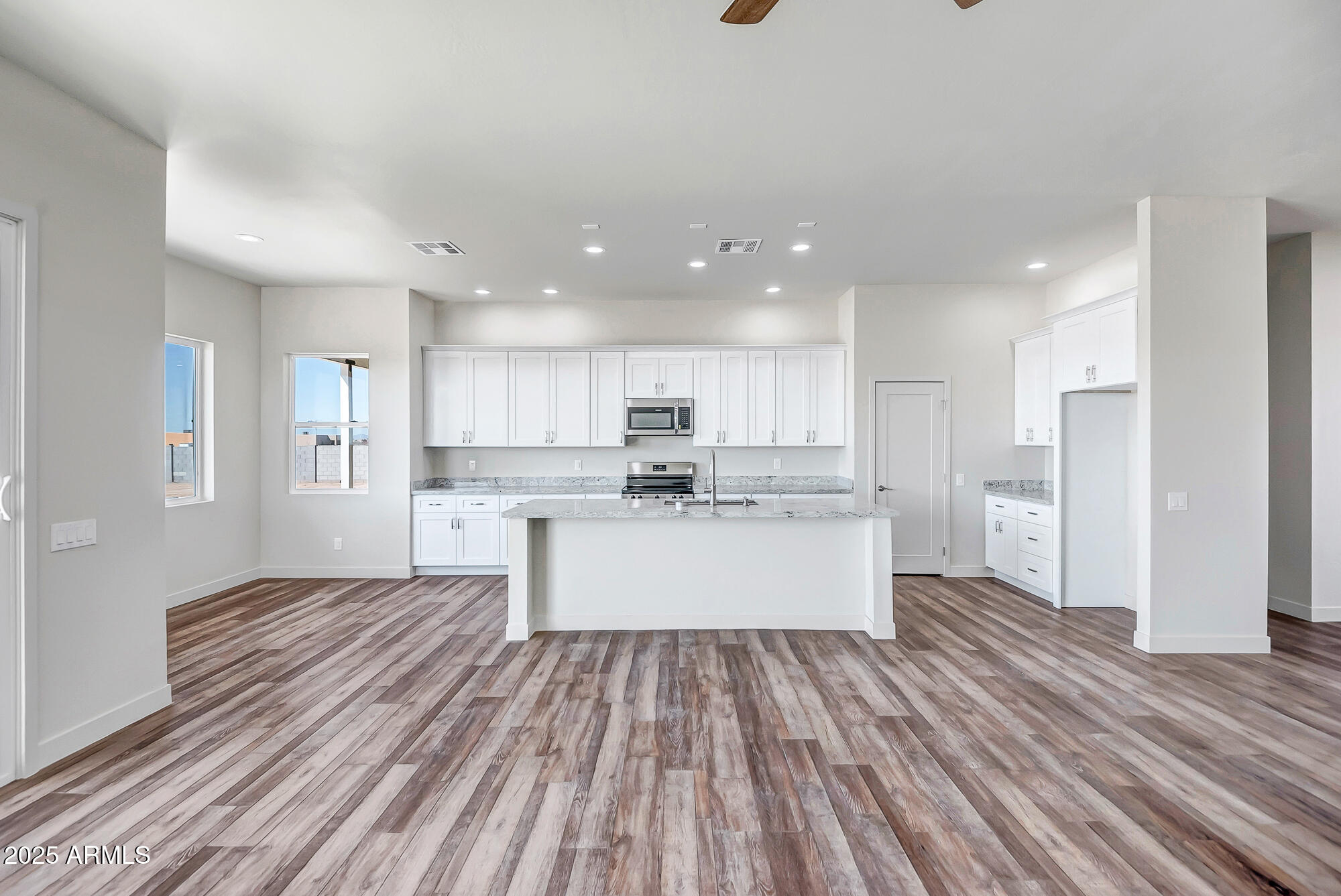 25113 West Lowden Road Wittmann, AZ 85361 - Photo 5 of 37 Great room kithcen area