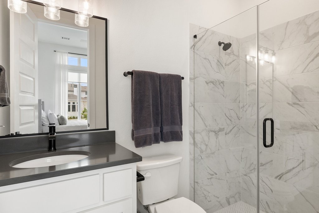 802 Geiger Path Austin, TX 78738 - Photo 12 of 40 Second Full bath with a stand up shower and vanity