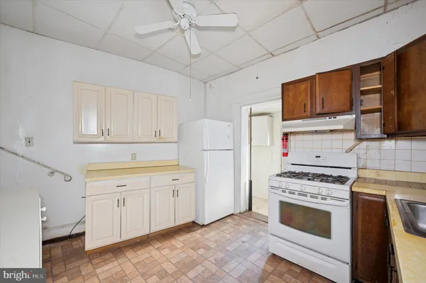 a utility room with a window dryer and washer
