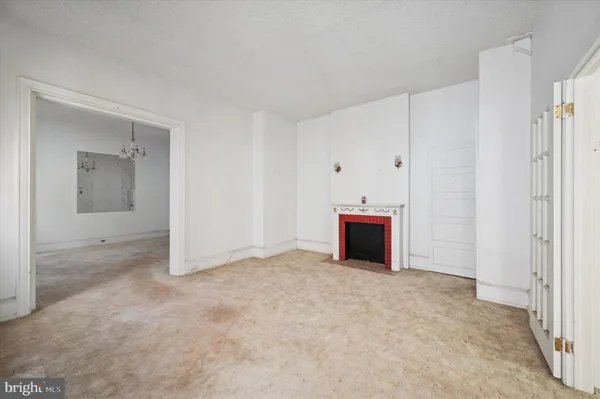 a view of a livingroom with a fireplace