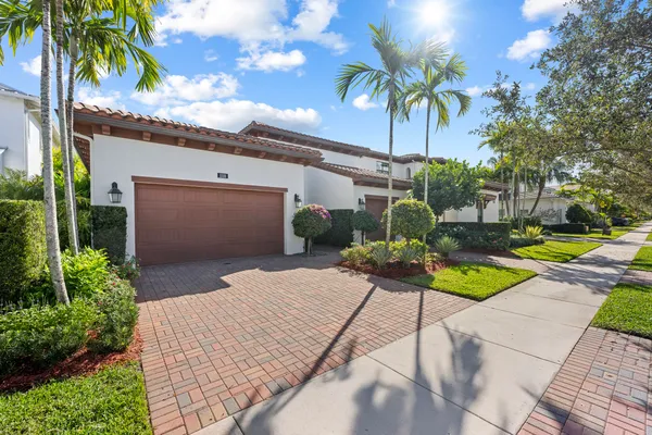a view of a backyard with a patio