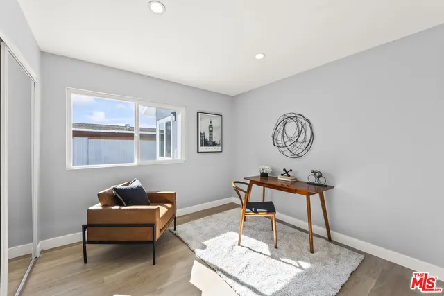 a living room with furniture a window and a window