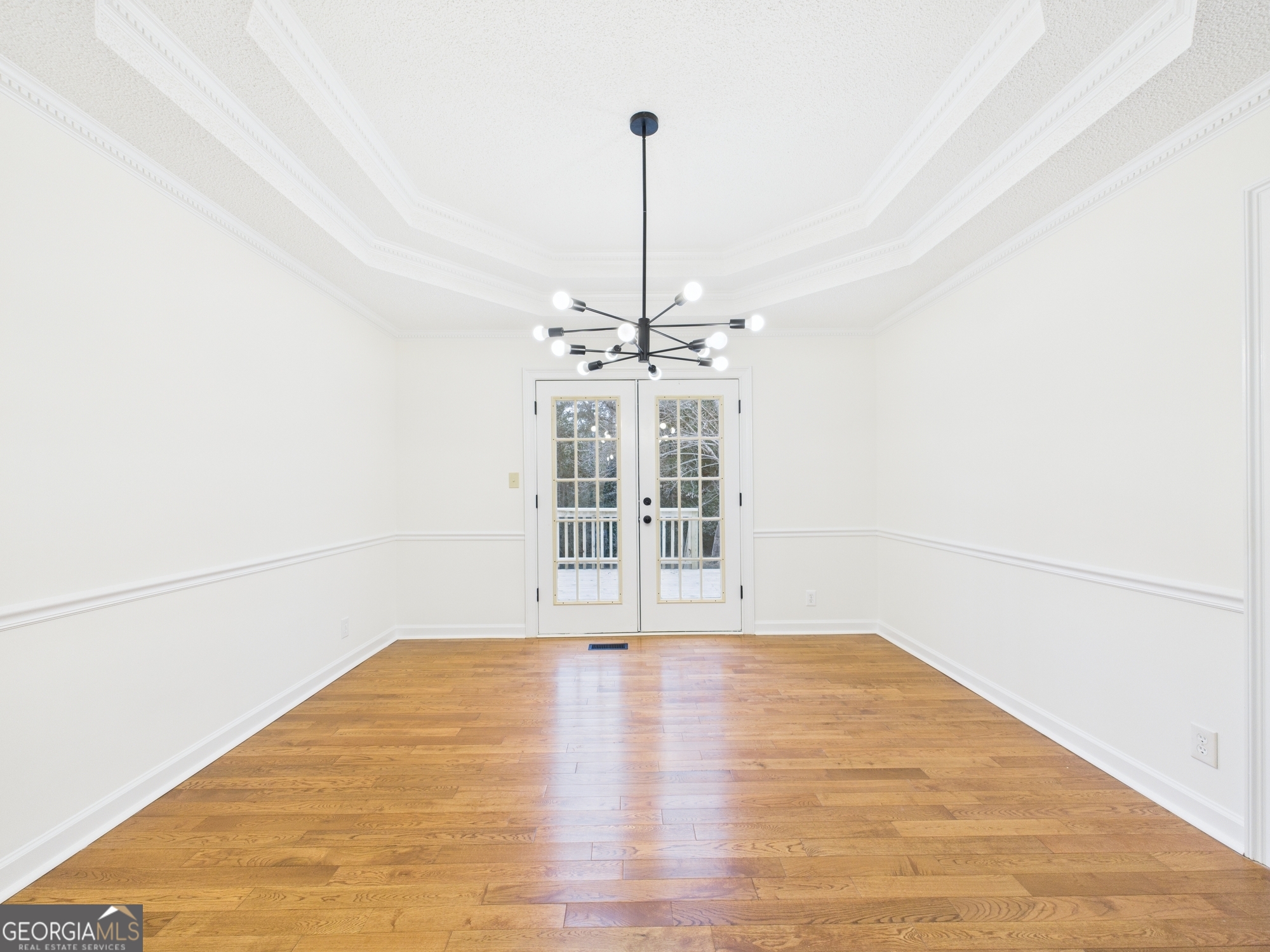 607 Chastain Place Macon, GA 31210 - Photo 23 of 63 a view of a room with wooden floor ceiling fan