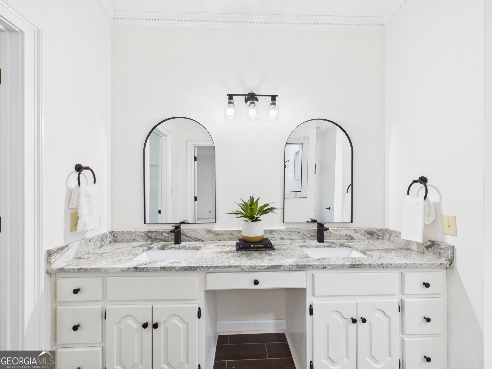 607 Chastain Place Macon, GA 31210 - Photo 41 of 63 a bathroom with double sink and a mirror