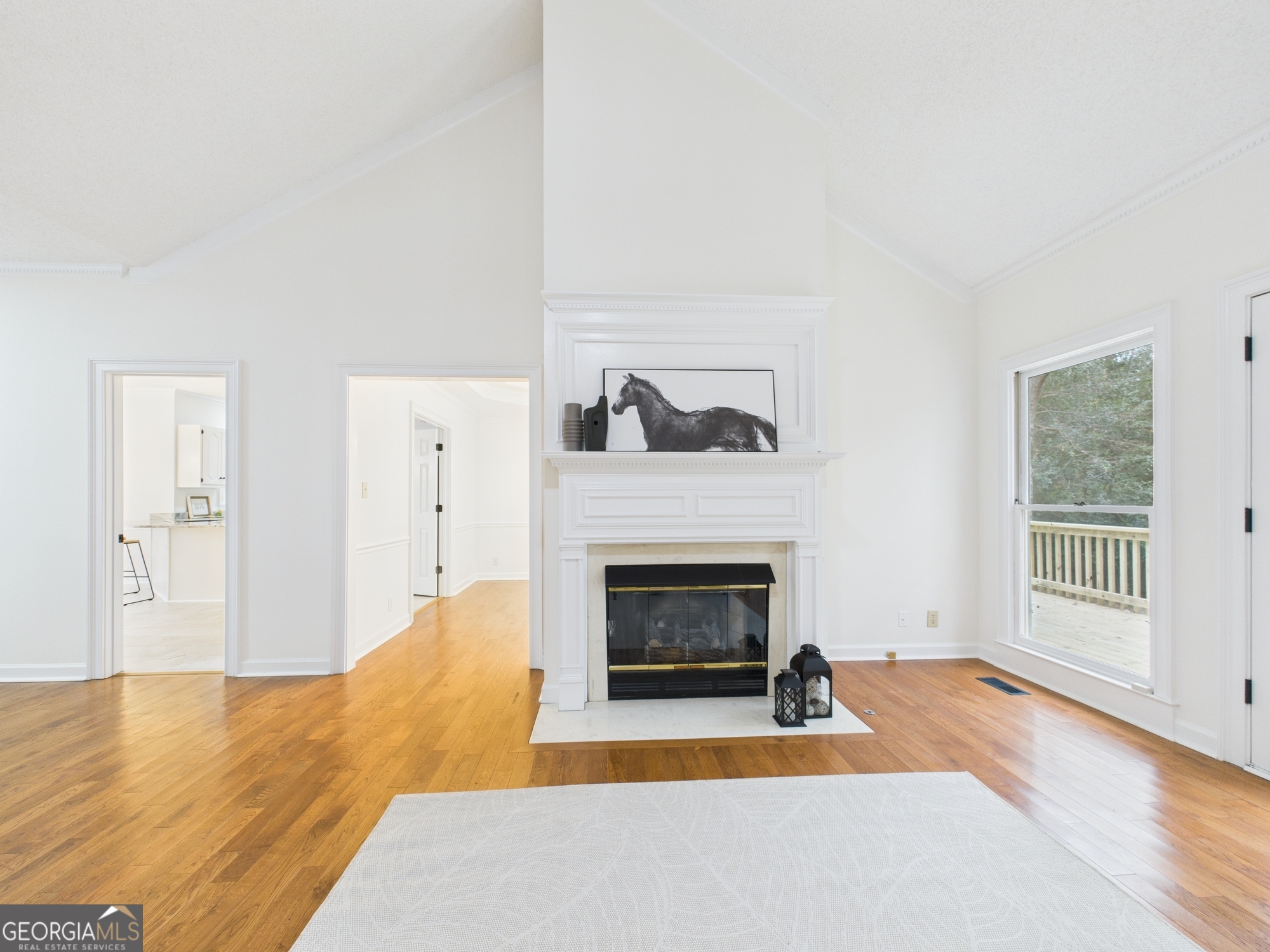 607 Chastain Place Macon, GA 31210 - Photo 6 of 63 a living room with furniture and a fireplace