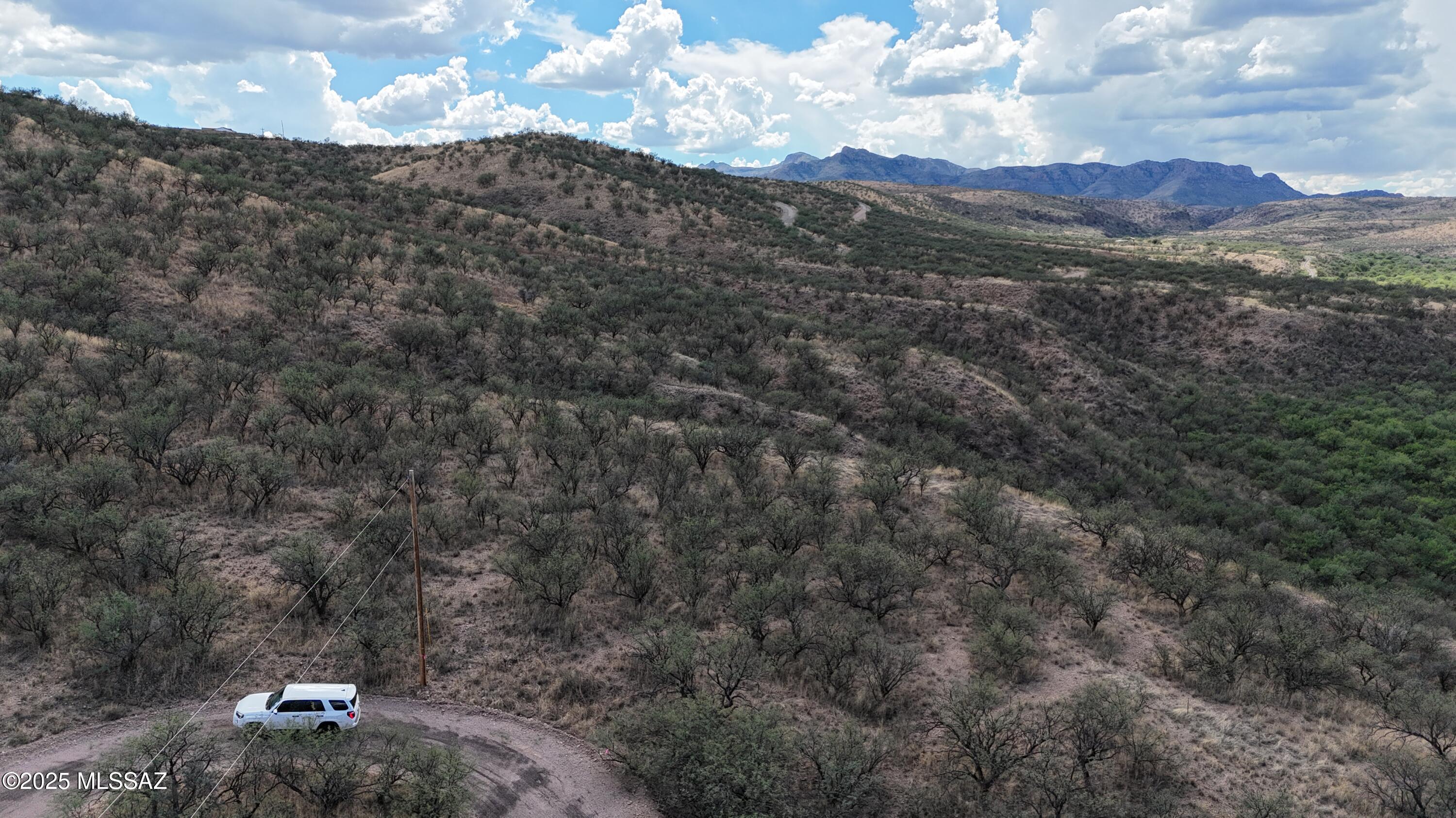 1366 Esta Court, Unit 29 Rio Rico, AZ 85648 - Photo 3 of 10 a view of a mountain