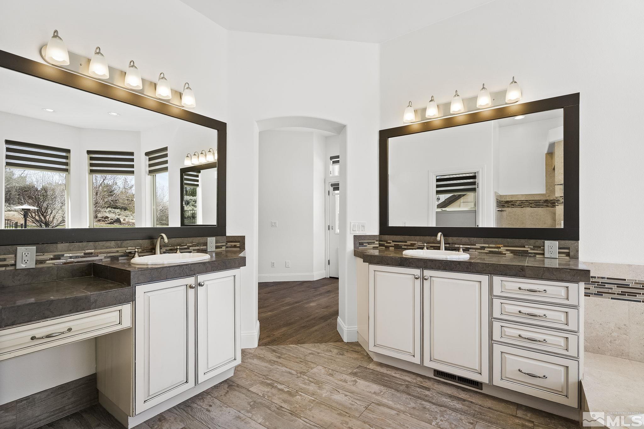 4900 Gallup Road Reno, NV 89511 - Photo 17 of 38 a kitchen with a sink stove and cabinets