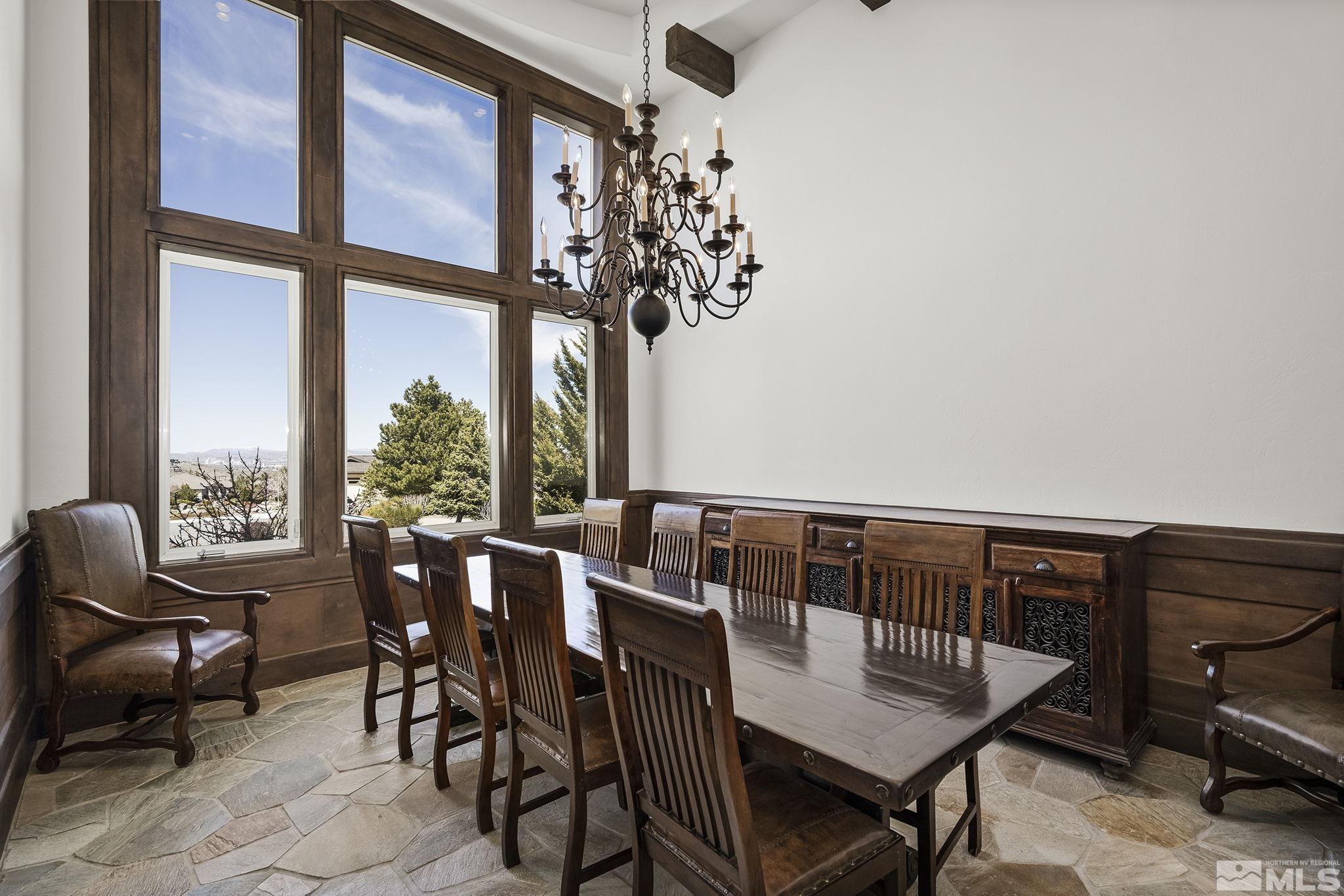 4900 Gallup Road Reno, NV 89511 - Photo 20 of 38 a view of a dining room with furniture window and outside view