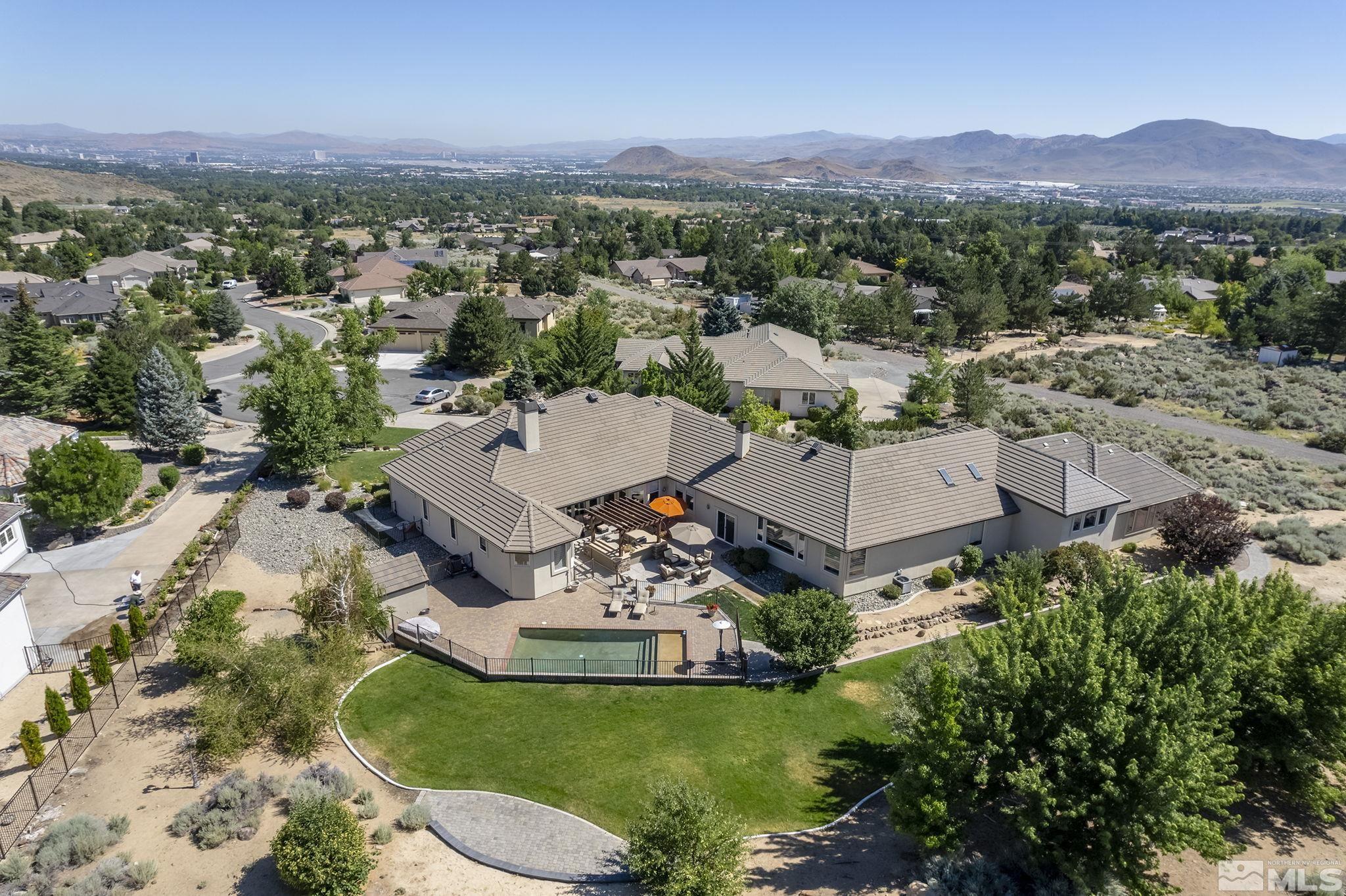4900 Gallup Road Reno, NV 89511 - Photo 35 of 38 an aerial view of a house with a yard