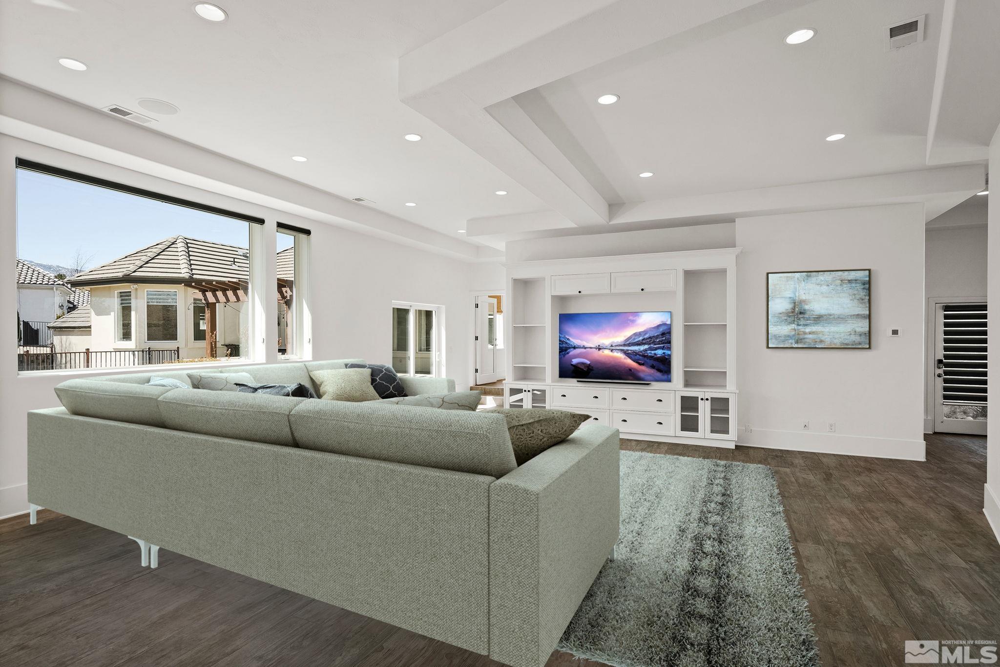 4900 Gallup Road Reno, NV 89511 - Photo 5 of 38 a living room with furniture and a flat screen tv