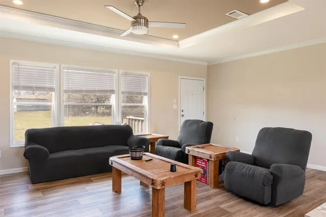 a living room with furniture and a window