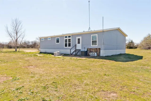 a view of a house with swimming pool