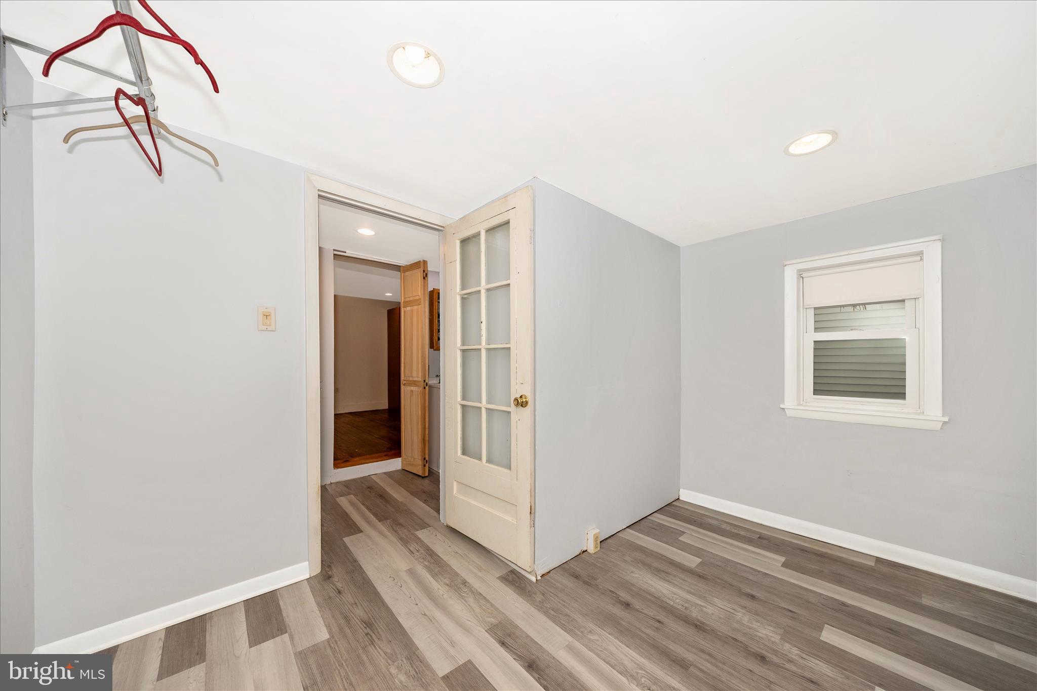 515 East Church Street Frederick, MD 21701 - Photo 30 of 56 Bedroom 2 has vinyl plank flooring and French door