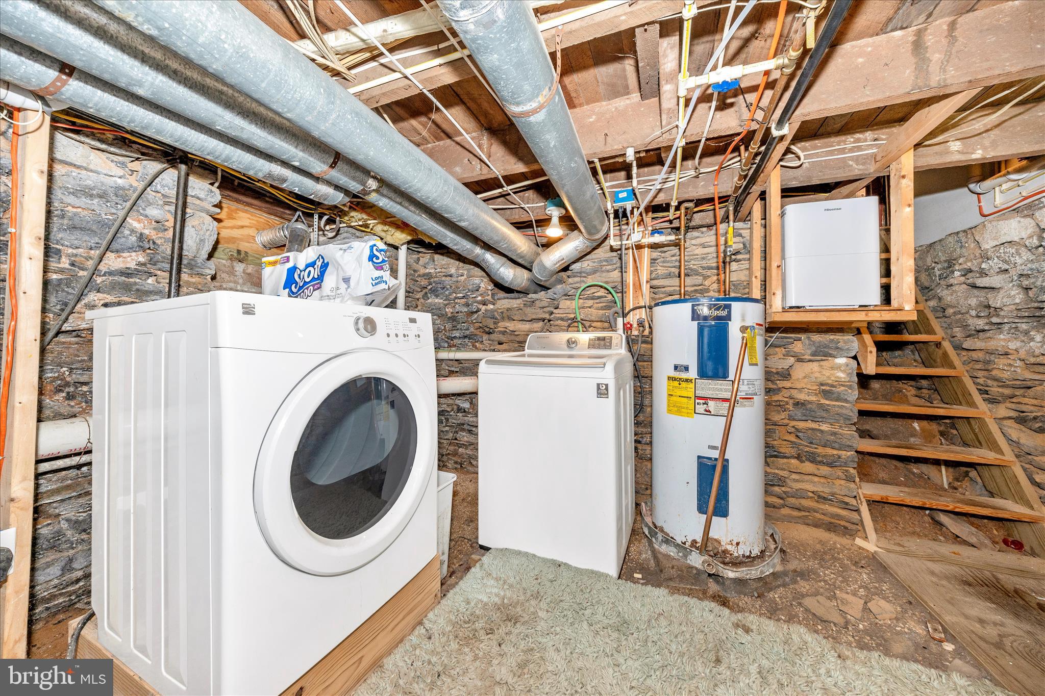 515 East Church Street Frederick, MD 21701 - Photo 34 of 56 Basement laundry area and hot water heater