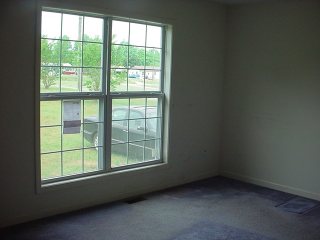 5635 Bell Road Dillwyn, VA 23936 - Photo 4 of 10 an empty room with a window