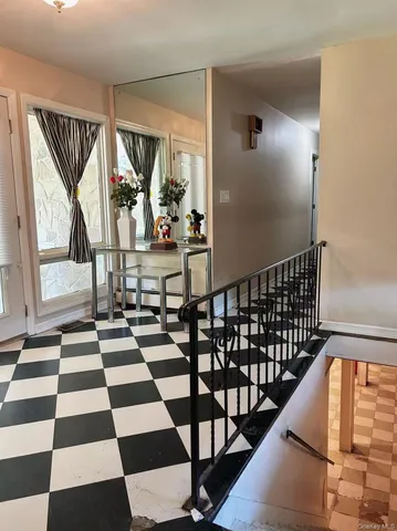 a view of a black and white checkered floor