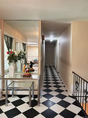 a dining room with a table and chairs
