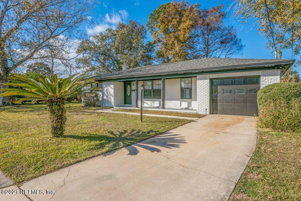 5115 Brighton Drive Jacksonville, FL 32217 - Photo 3 of 37 a view of pool with a yard