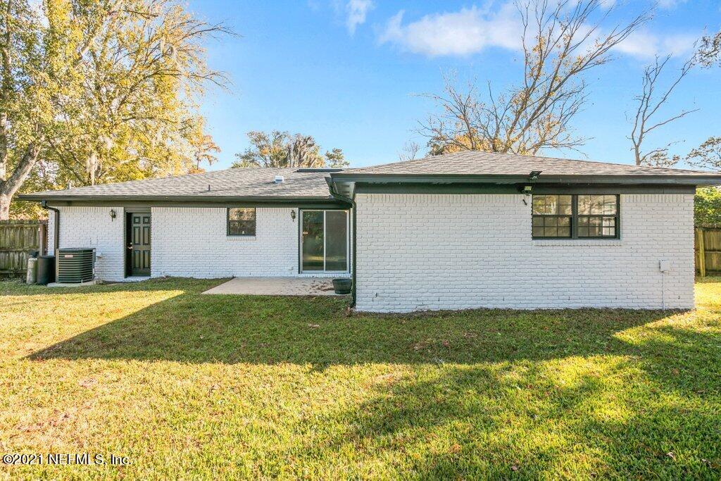 5115 Brighton Drive Jacksonville, FL 32217 - Photo 35 of 37 a view of a house with a backyard