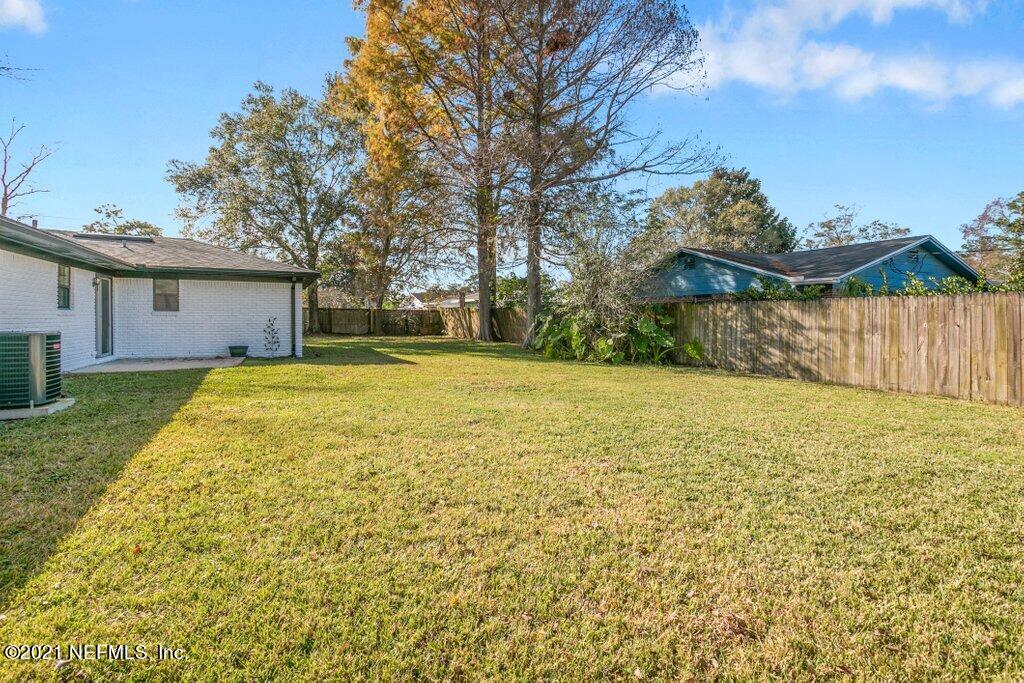 5115 Brighton Drive Jacksonville, FL 32217 - Photo 37 of 37 a view of a house with a yard