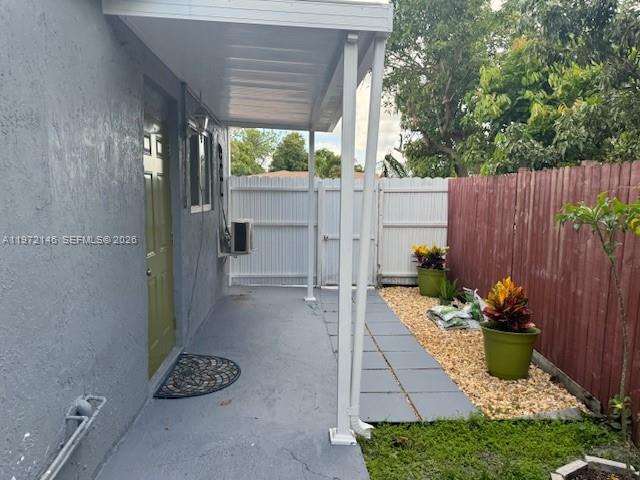 6471 Southwest 27th Street, Unit 2 Miramar, FL 33023 - Photo 2 of 15 a view of a backyard with sitting area