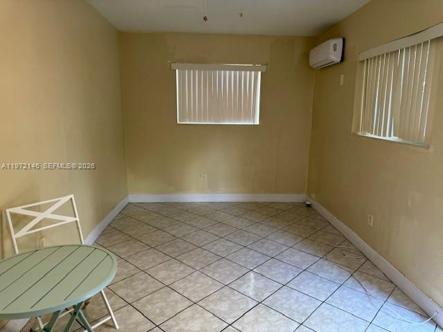 6471 Southwest 27th Street, Unit 2 Miramar, FL 33023 - Photo 4 of 15 a view of room with window