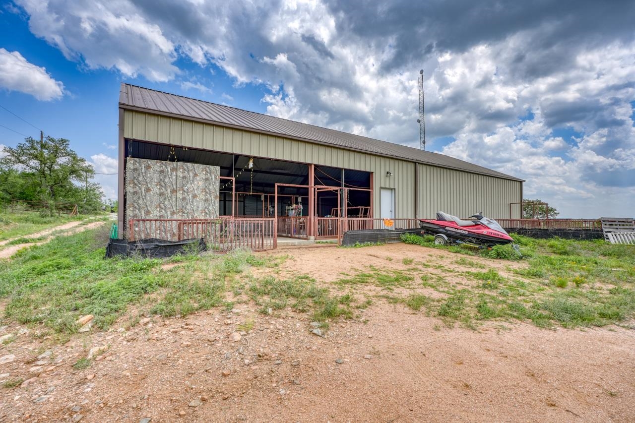 791 Ranch Road 2323 Llano, TX 78643 - Photo 21 of 30 a front view of a house with garden