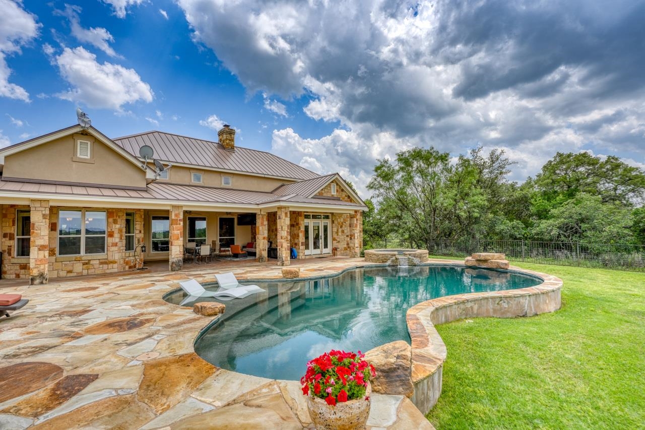 791 Ranch Road 2323 Llano, TX 78643 - Photo 24 of 30 a front view of a house with garden