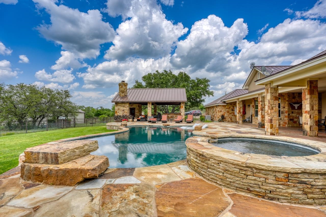 791 Ranch Road 2323 Llano, TX 78643 - Photo 25 of 30 a view of a house with a yard