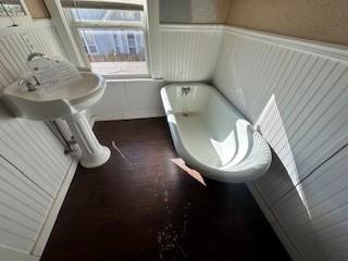 611 Chestnut Street Bonham, TX 75418 - Photo 14 of 14 a bathroom with a toilet and a sink