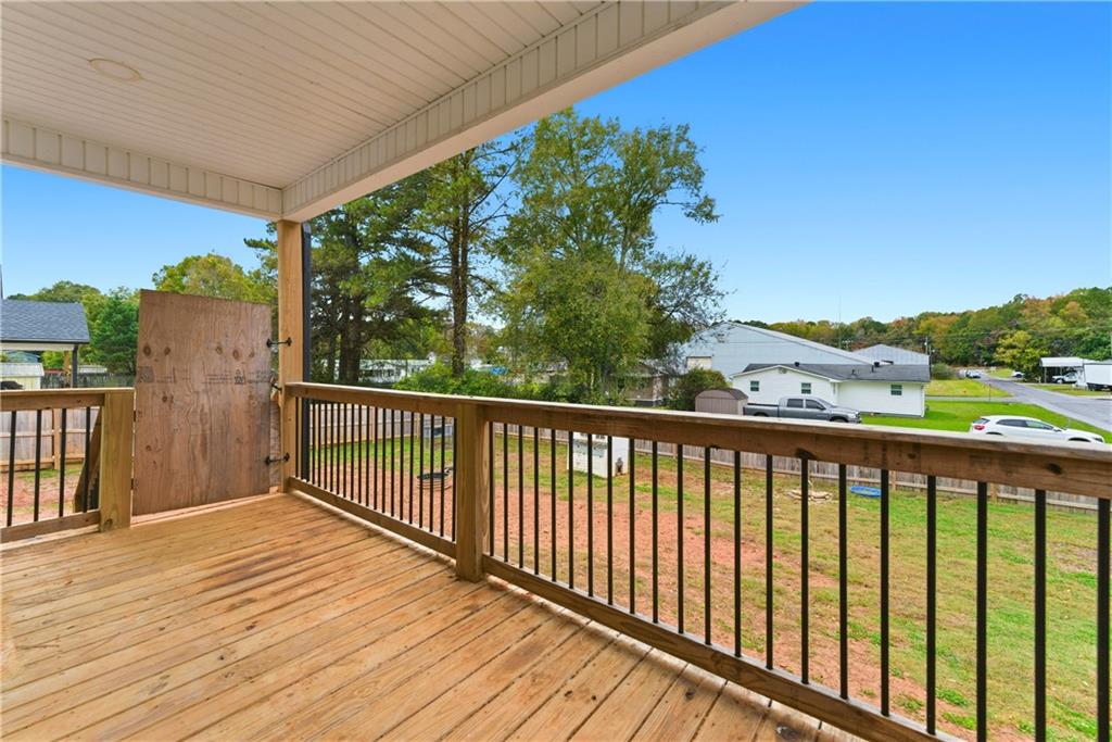 62 Dude Street Northwest Rome, GA 30165 - Photo 19 of 22 a view of a balcony with wooden floor