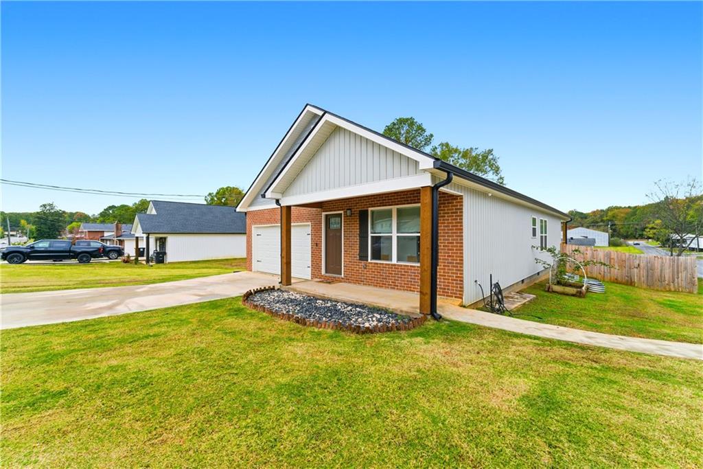 62 Dude Street Northwest Rome, GA 30165 - Photo 3 of 22 a view of an house with backyard and swimming pool