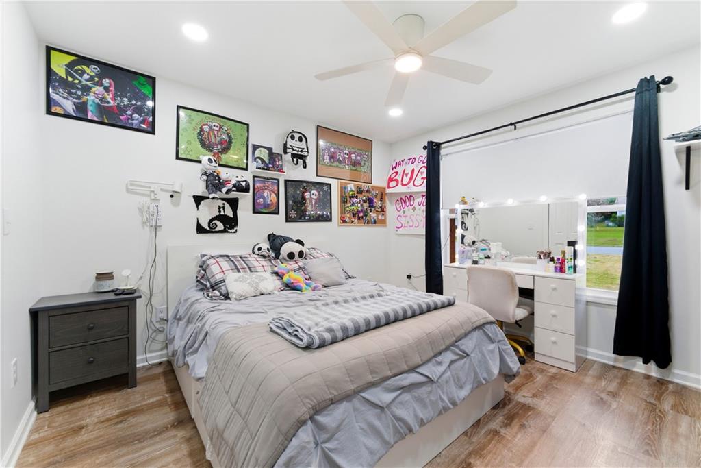 62 Dude Street Northwest Rome, GA 30165 - Photo 5 of 22 a bedroom with a bed and a window