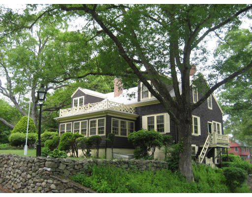26 Hillside Road Cumberland, RI 02864 - Photo 1 of 1 a front view of a house with a garden