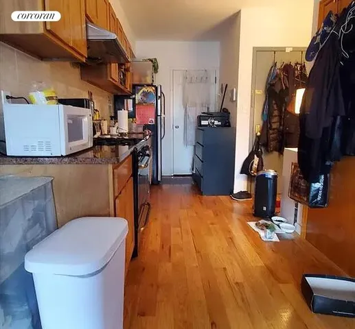 a bedroom with a bed and dresser