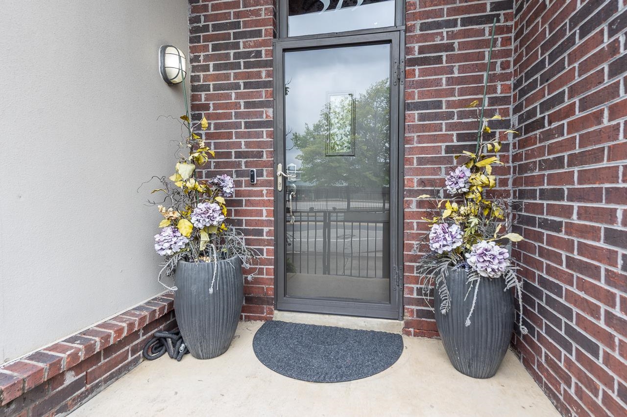 573 South Front Street Memphis, TN 38103 - Photo 2 of 40 a view of a potted plant in front of a door