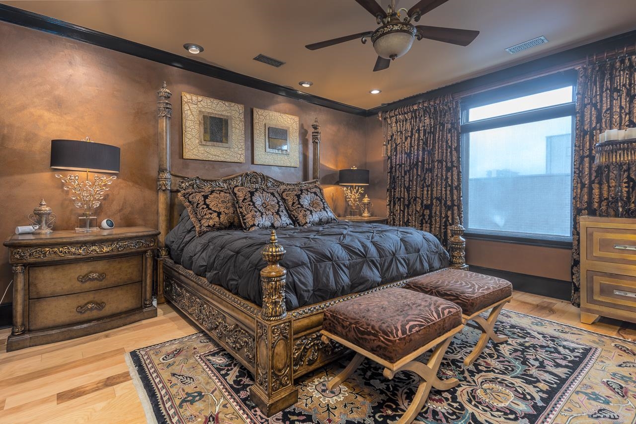 573 South Front Street Memphis, TN 38103 - Photo 25 of 40 a bedroom with a bed and window