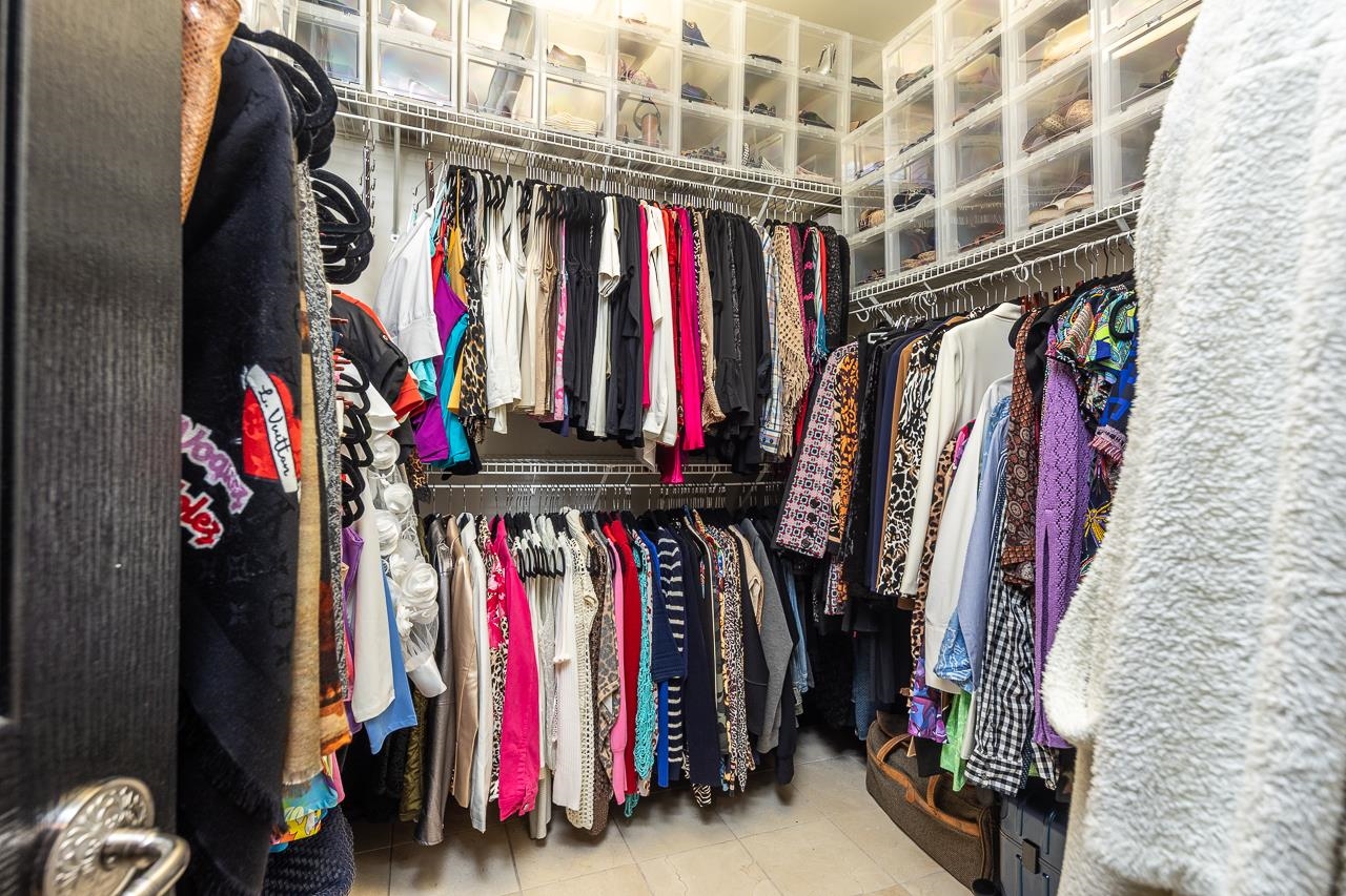 573 South Front Street Memphis, TN 38103 - Photo 31 of 40 a view of walk in closet with clothes